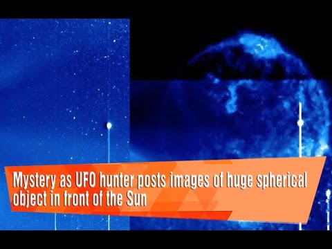 Mystery as UFO hunter posts images of huge spherical object in front of the Sun.